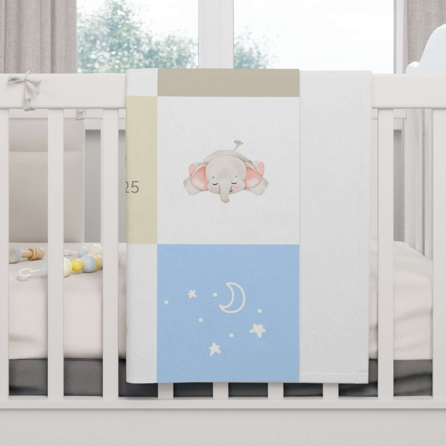 Personalized Patchwork Design Baby Boy Blanket draped over a crib, featuring a cute baby elephant illustration.