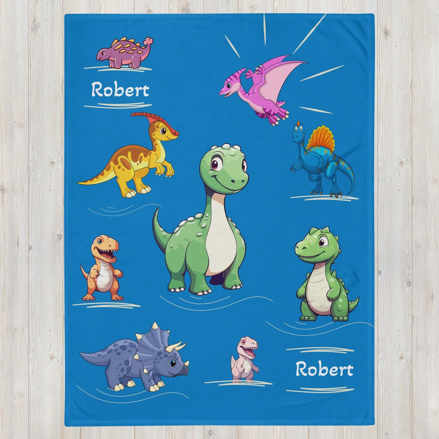 Personalized Dinosaur Throw Blanket against a gray background