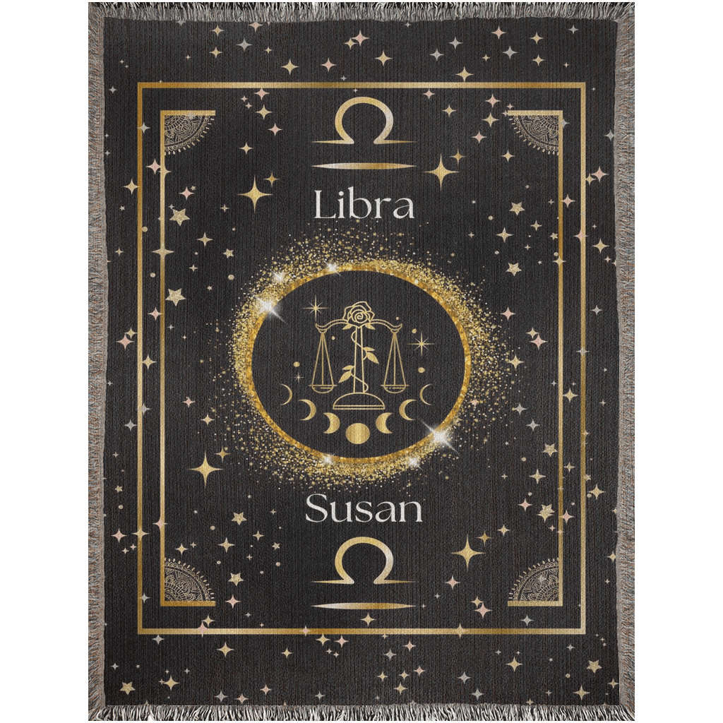 Gold and black Libra zodiac blanket, made of woven fabric.