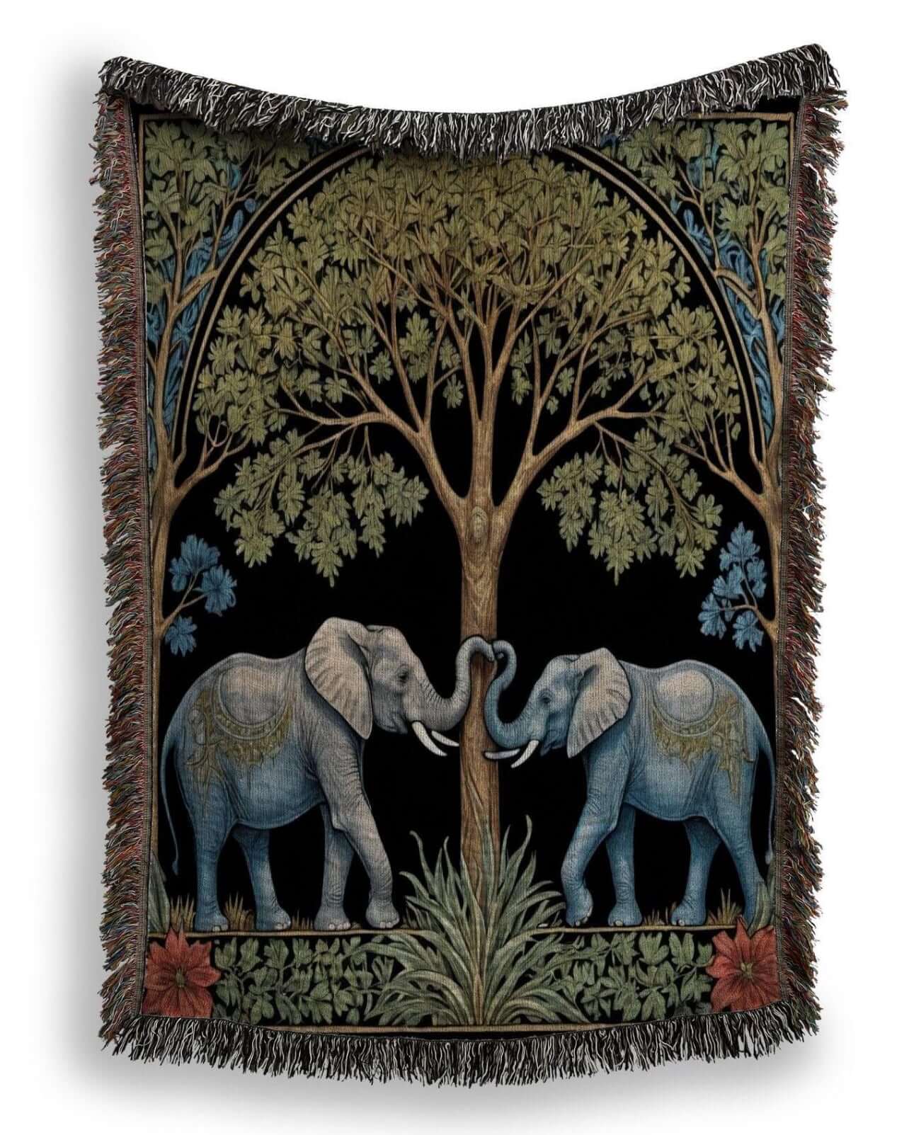 Two elephants on a woven fringed blanket against a white background.