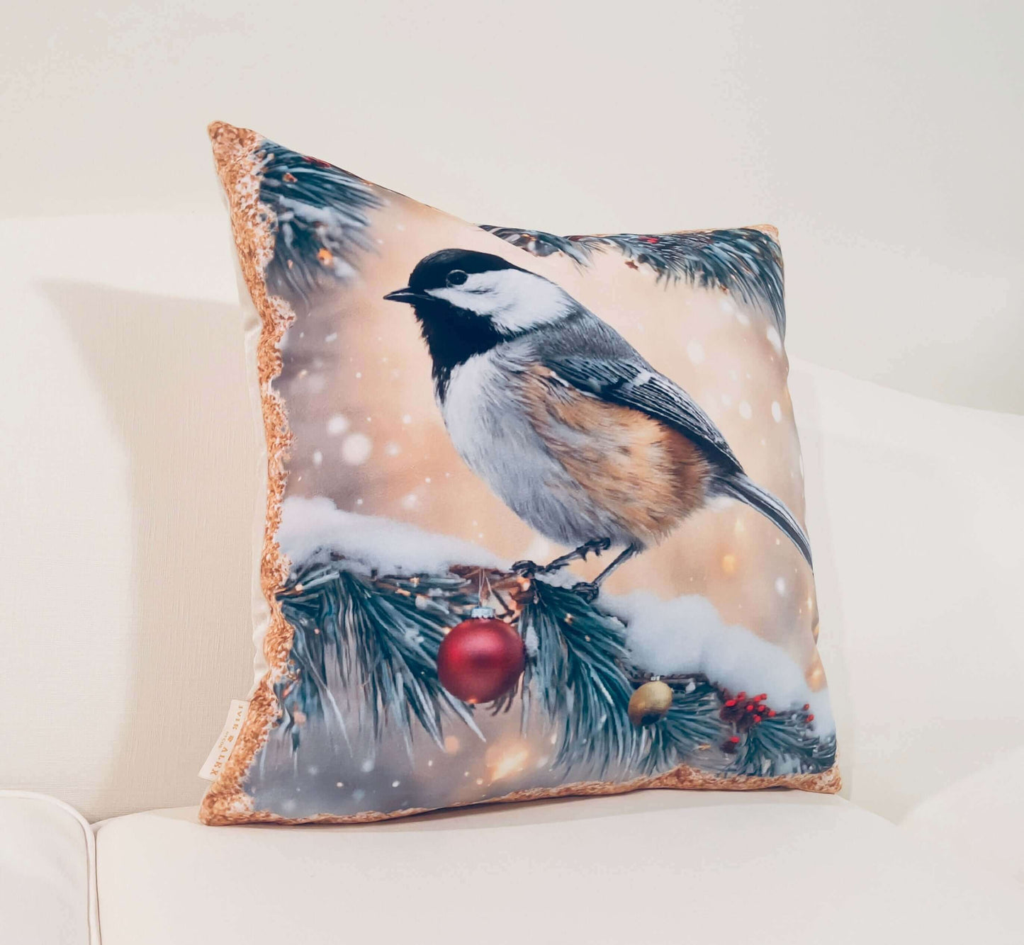 Mountain Chickadee Velvet Pillow Cover on a white sofa
