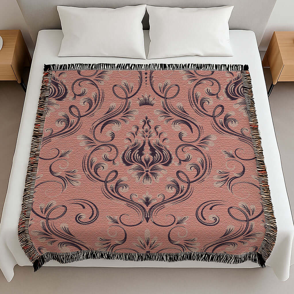 Pink And Navy Damask Woven Pillow on a bed showcasing intricate floral pattern and cozy texture.