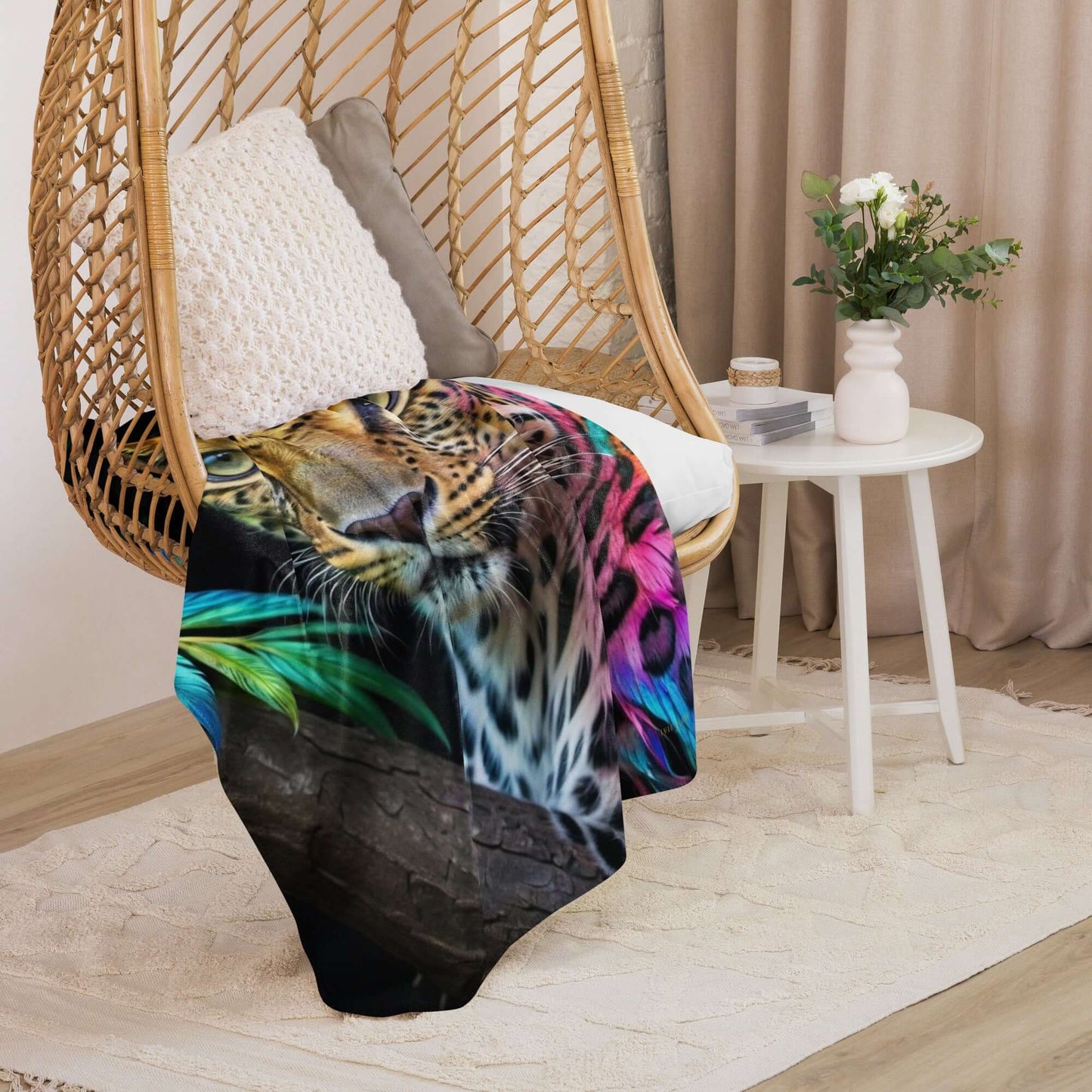 Neon Cheetah Printed Sherpa Blanket draped over a wooden chair