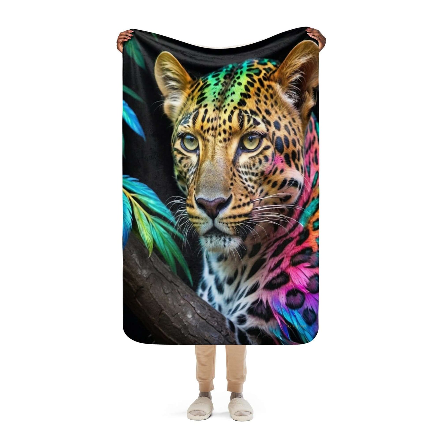 person holding up the small Neon Cheetah Printed Sherpa Blanket