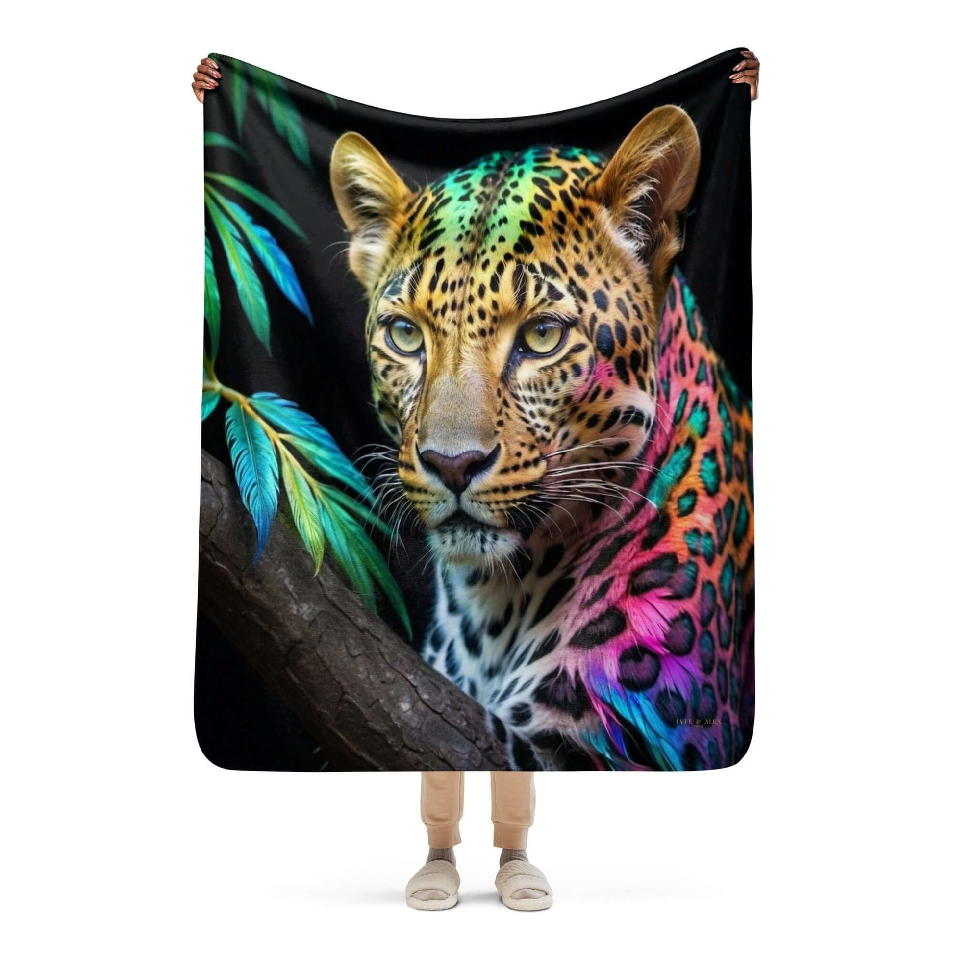 person holding up the medium Neon Cheetah Printed Sherpa Blanket