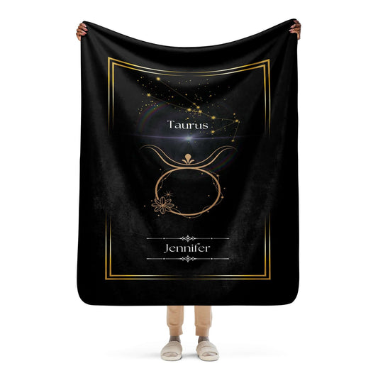 Personalized Taurus Zodiac Sign Sherpa Blanket held up by a person against a white background