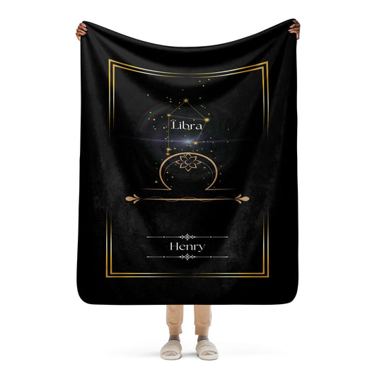 A person holding up the Personalized Libra Zodiac Sign Sherpa Blanket