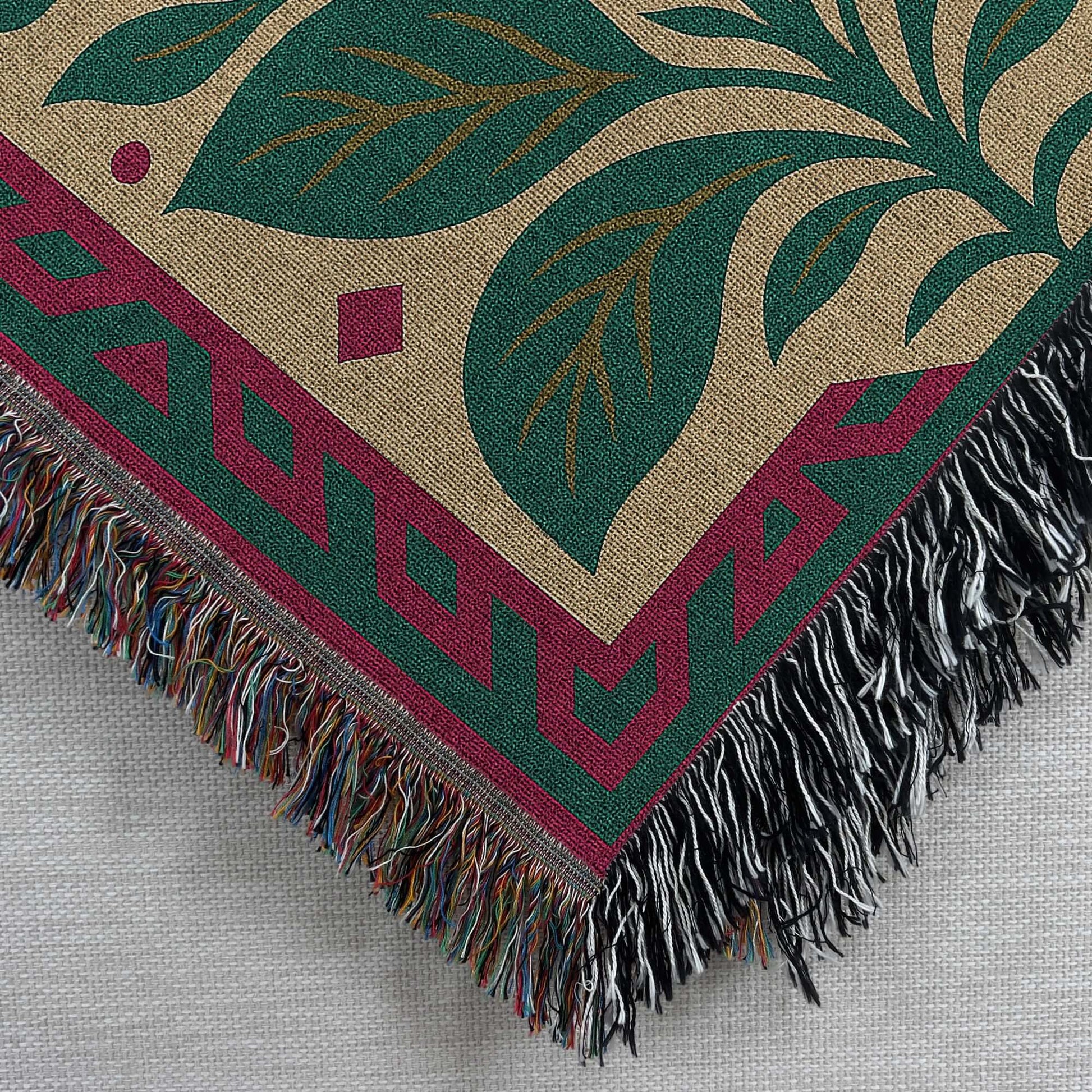 Closeup of the Art Deco Inspired Floral Blanket Tapestry with intricate floral design and colorful fringe detailing.