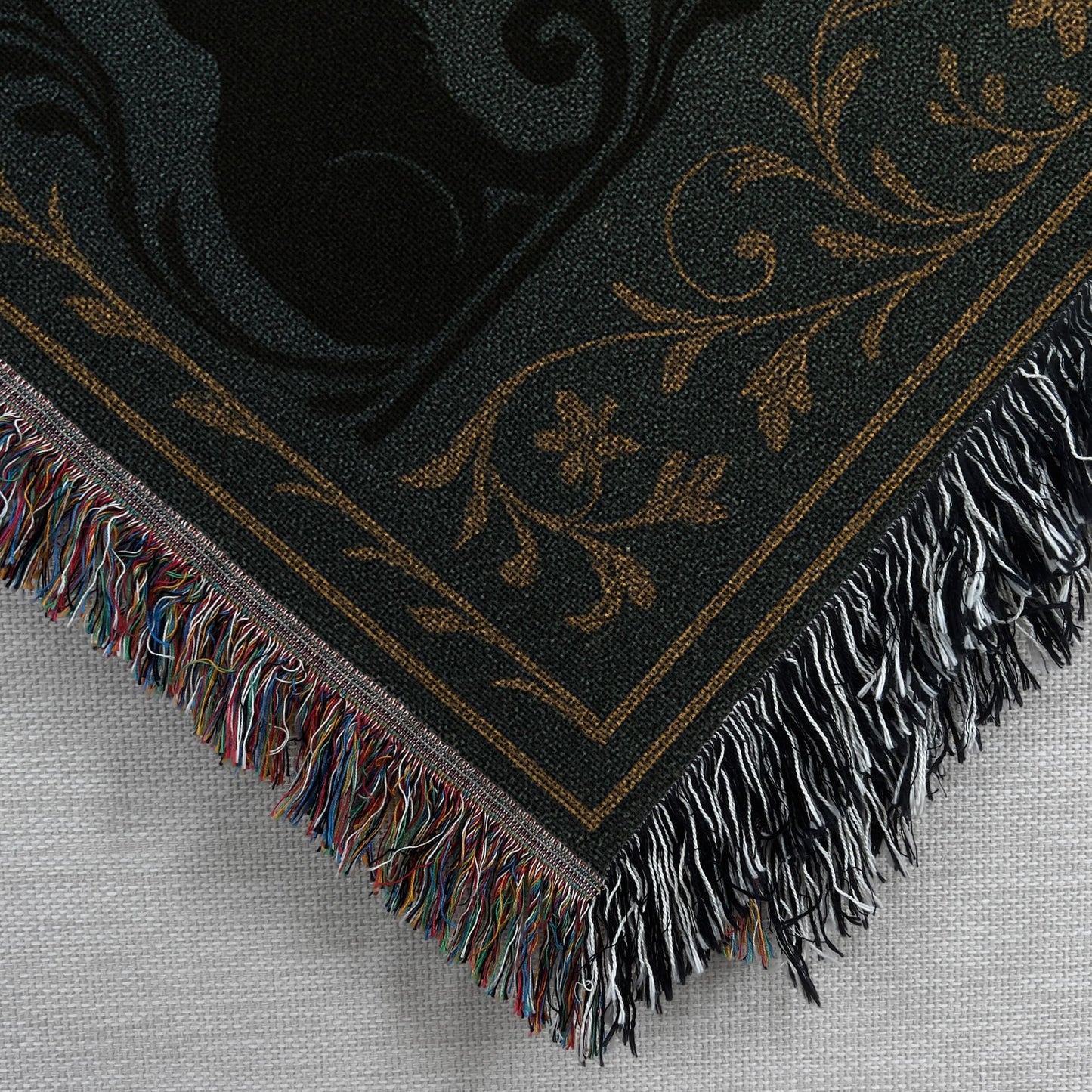 Closeup corner view of the Celestial Black Cats Woven Blanket Tapestry