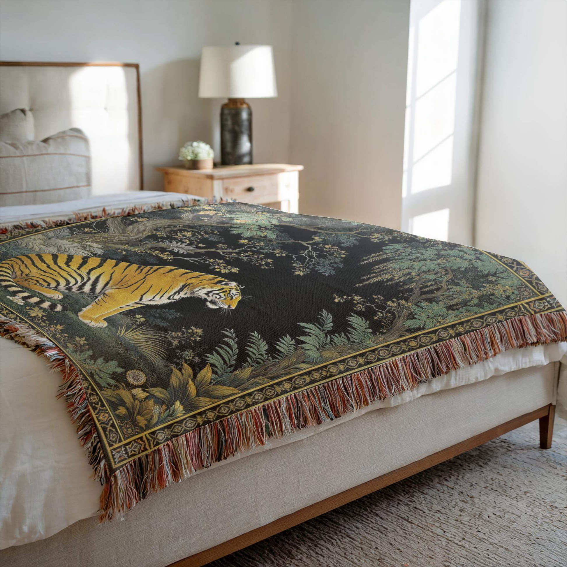 Side view of the Exotic Tiger Woven Throw Blanket draped on a bed