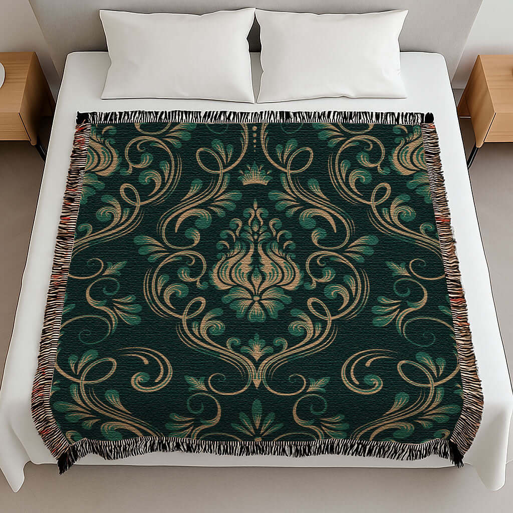 Overhead view of the Dark Green Damask Woven Blanket draped on a bed