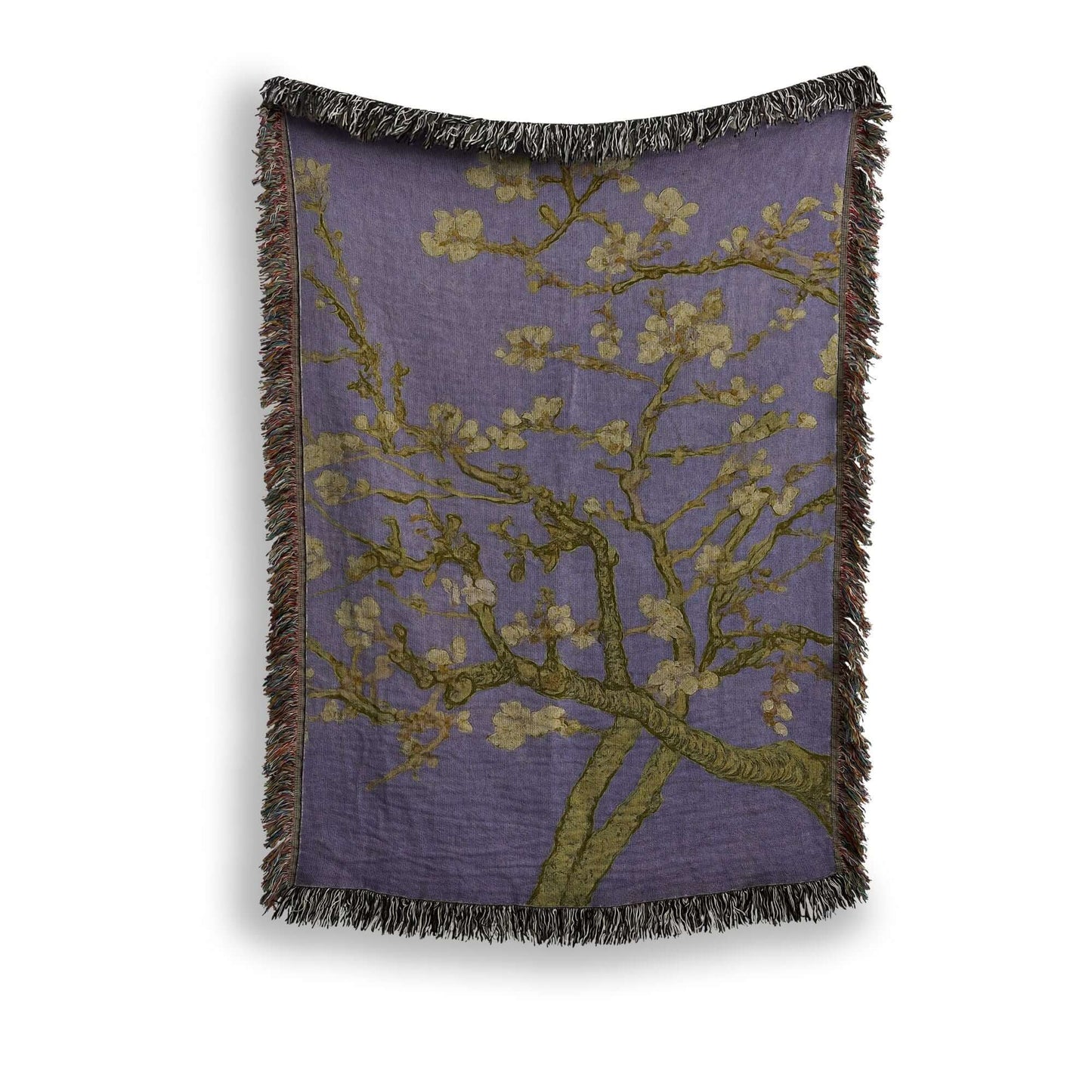 Lavender Almond Blossom Woven Blanket showcasing a delicate blossom design on a lavender background with fringe.