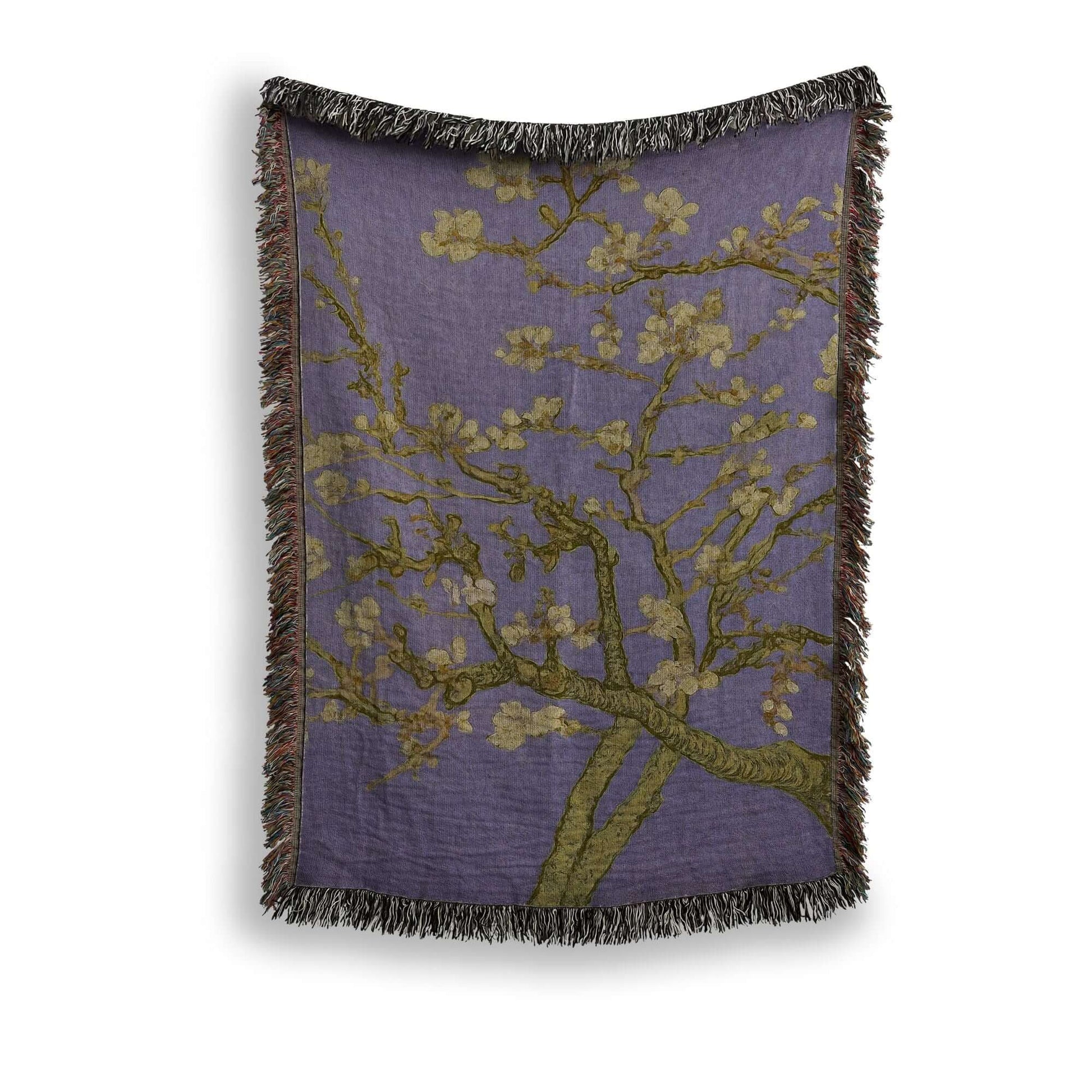 Lavender Almond Blossom Woven Blanket showcasing a delicate blossom design on a lavender background with fringe.