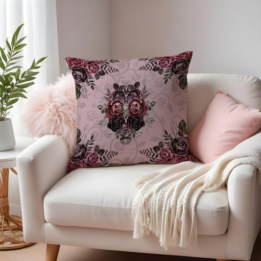 Mauve Pink Damask Floral Pillow on a white armchair with a smaller pink pillow and pink fluffy blanket.