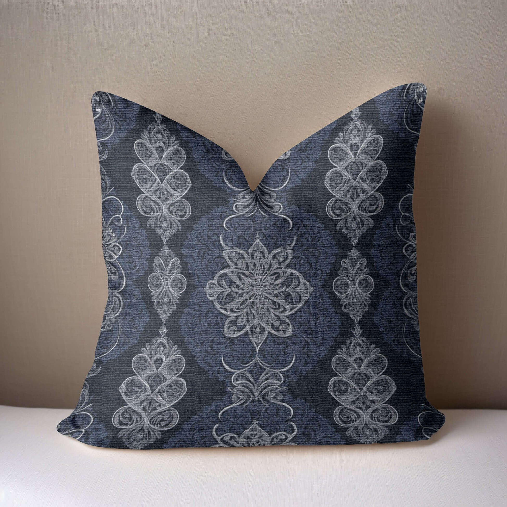 Navy White Damask Woven Pillow on a white surface with a taupe background.