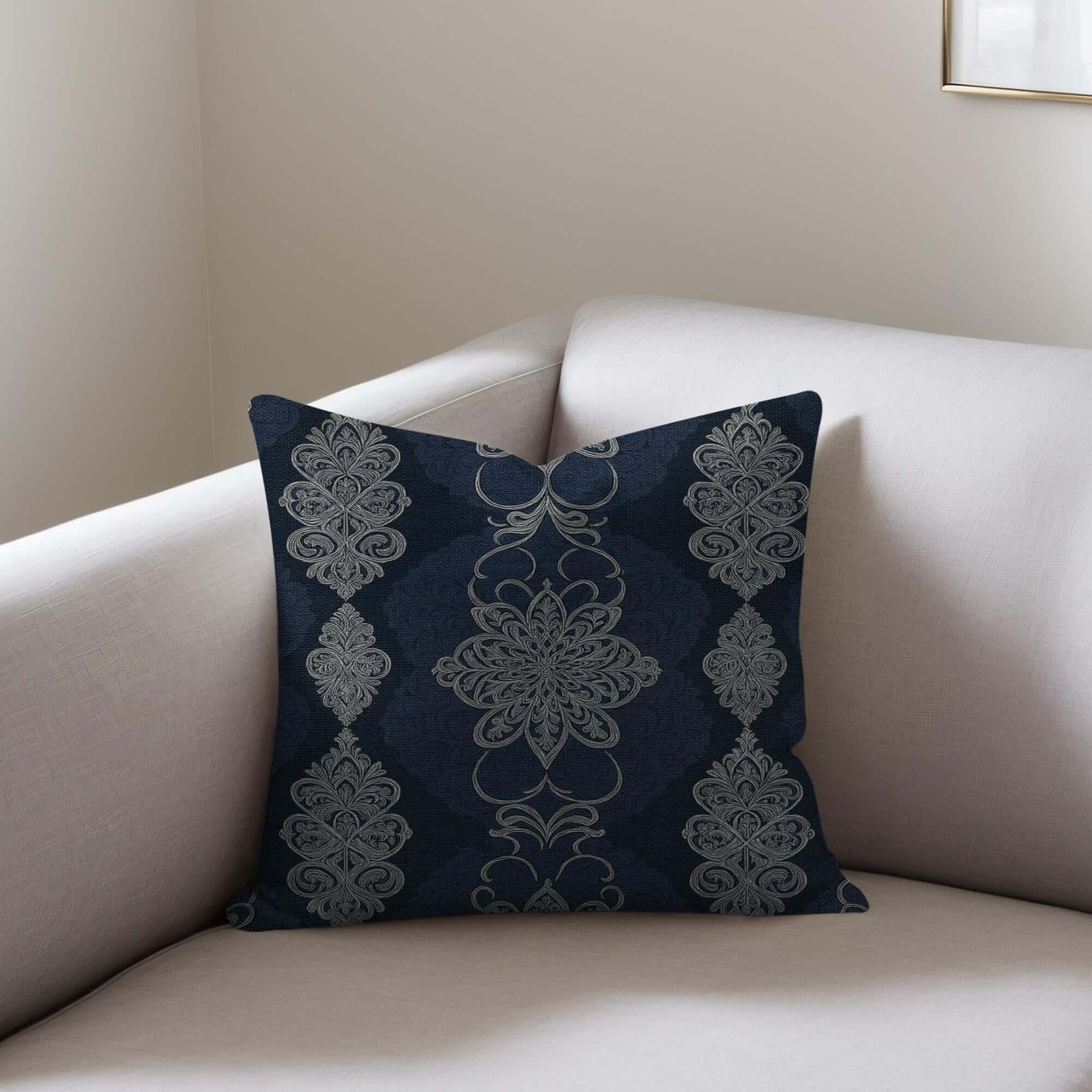Navy White Damask Woven Pillow on a gray sofa