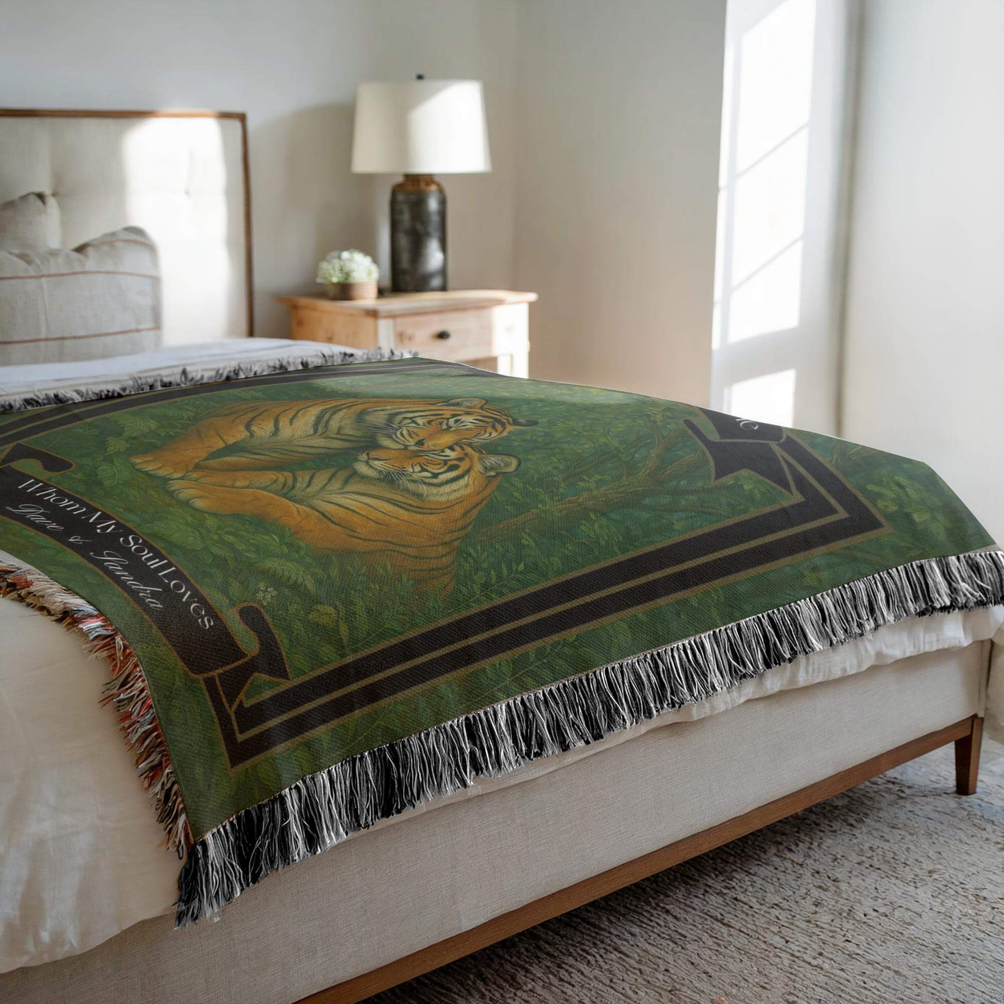 Side view of the Personalized Tigers Couples Blanket draped on a bed