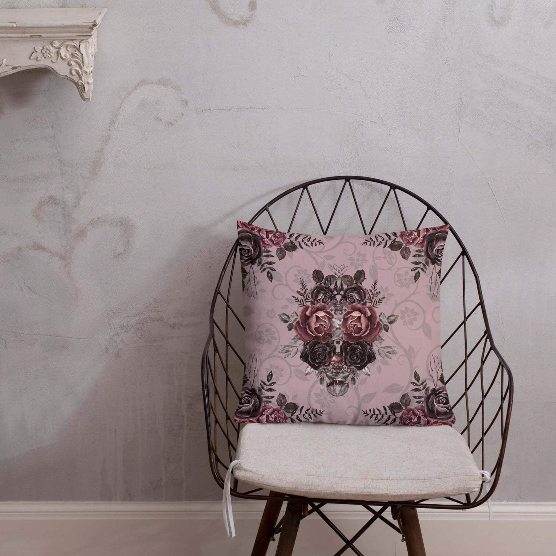 Mauve Pink Damask Floral Pillow on a chair.