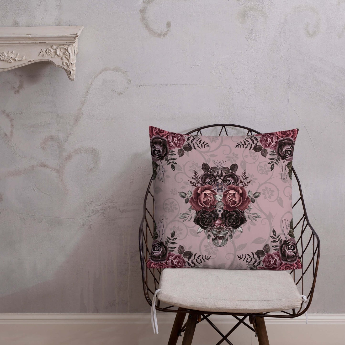 Mauve Pink Damask Floral Pillow on a chair.