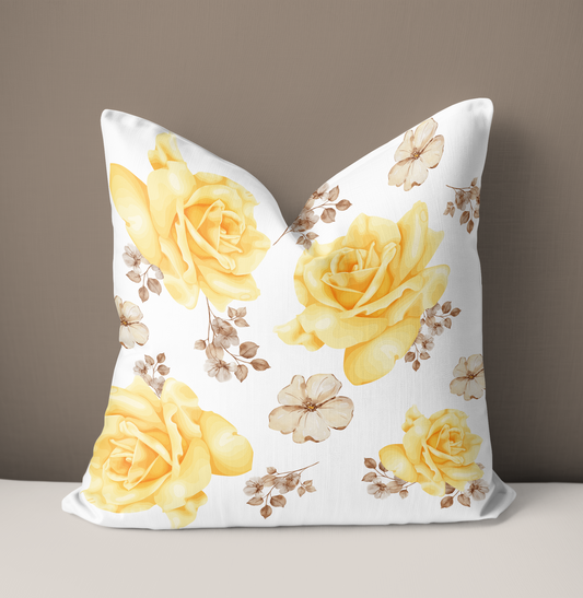 Yellow and white floral pillow. 