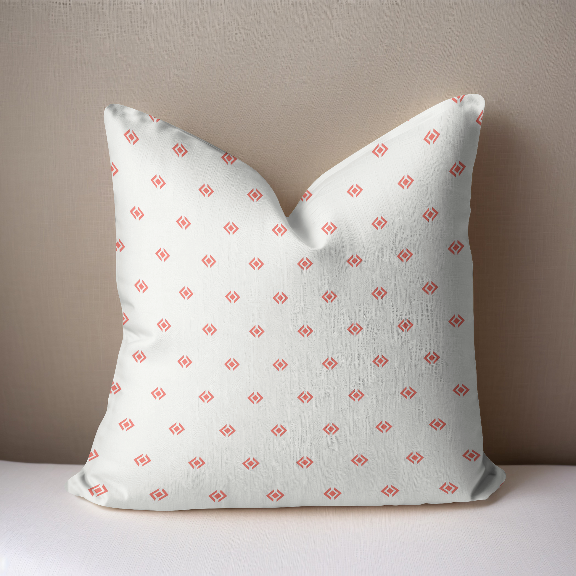 Coral and white geometric print pillow 