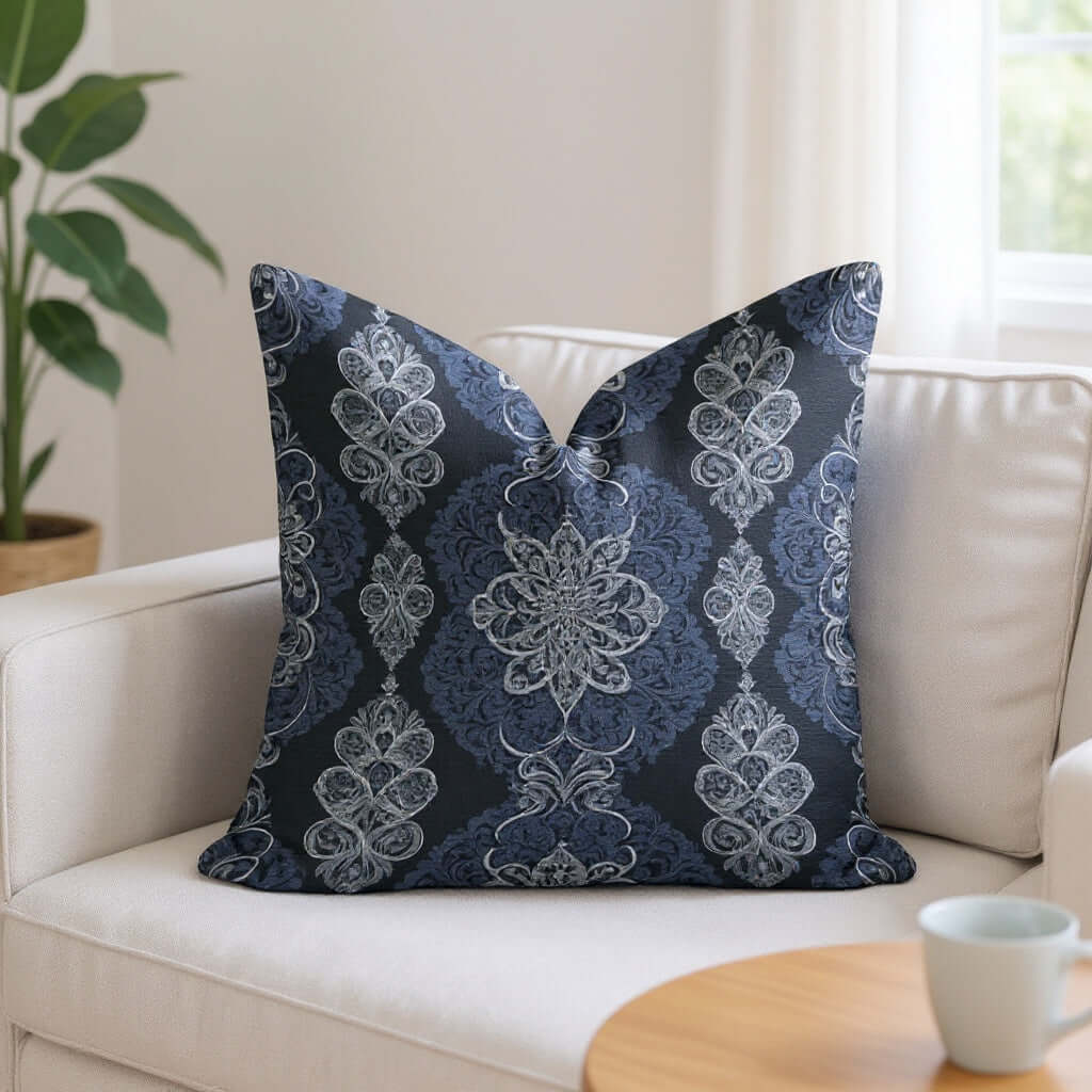 Navy White Damask Woven Pillow on a white sofa
