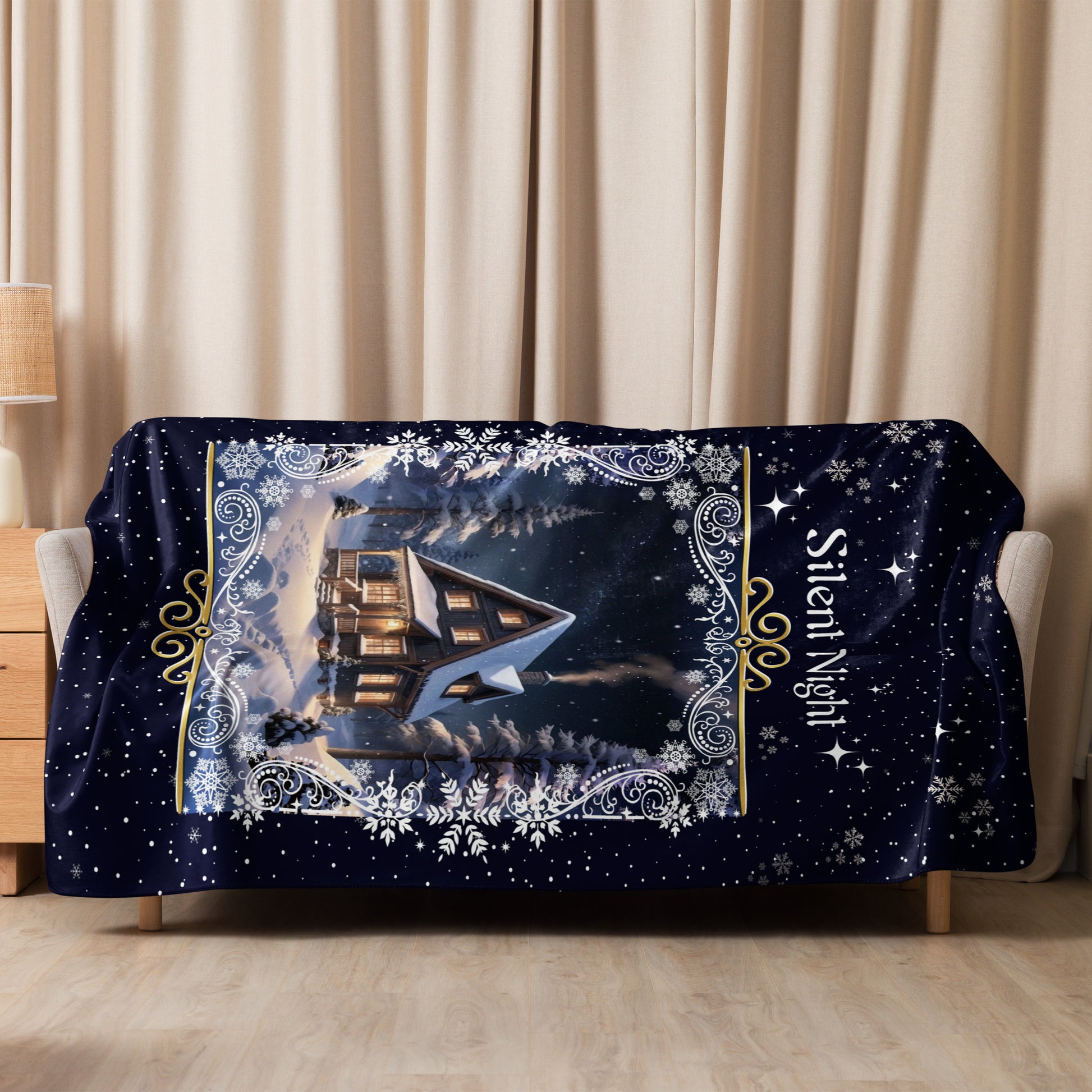 Personalized Silent Night Christmas Blanket against a white background draped over a sofa