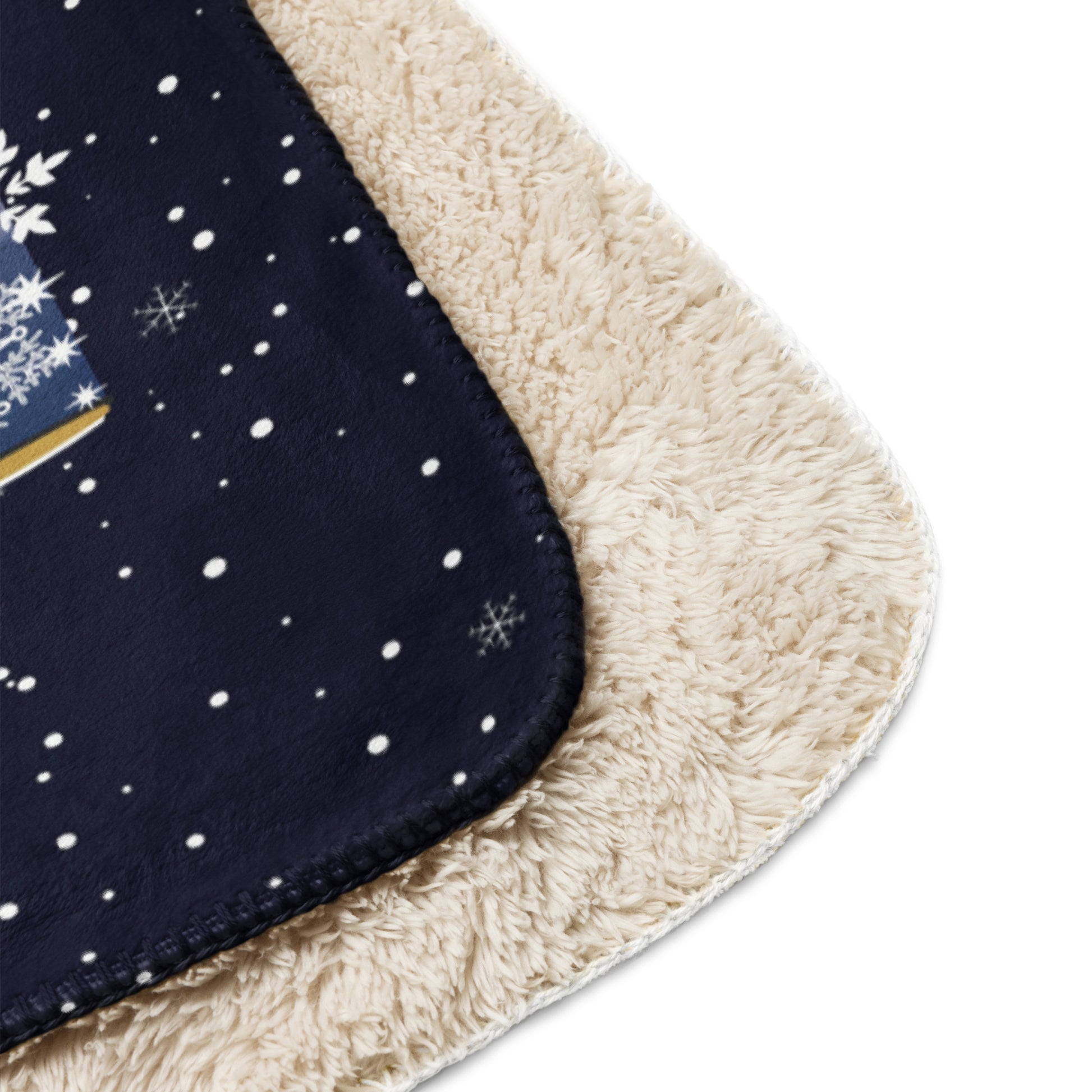 Closeup corner view of the Personalized Silent Night Christmas Blanket against a white background